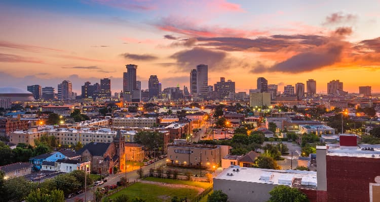 a view of the New Orleans skyline at sunset